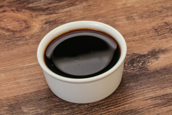 Asian soya sauce in the bowl jus de truffe noire